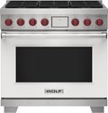 Wolf 36&quot; 6 Burner Dual Fuel Range (DF36650/WH/P) featuring white accent colored door and signature red Wolf knobs.